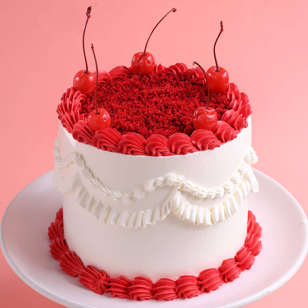 Zoomed View of Cherries N Cheers Red Velvet Cake