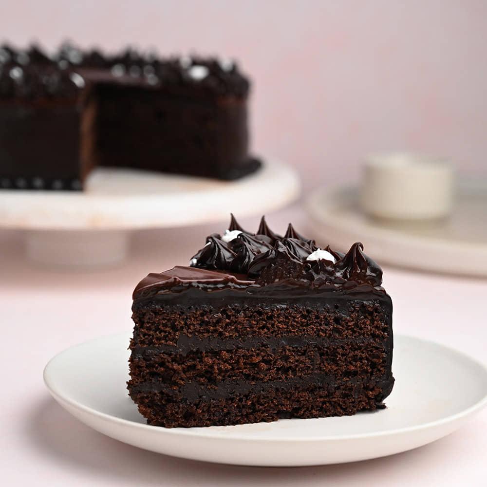 Zoomed View of Sliced Chocolate Truffle Symphony Cake