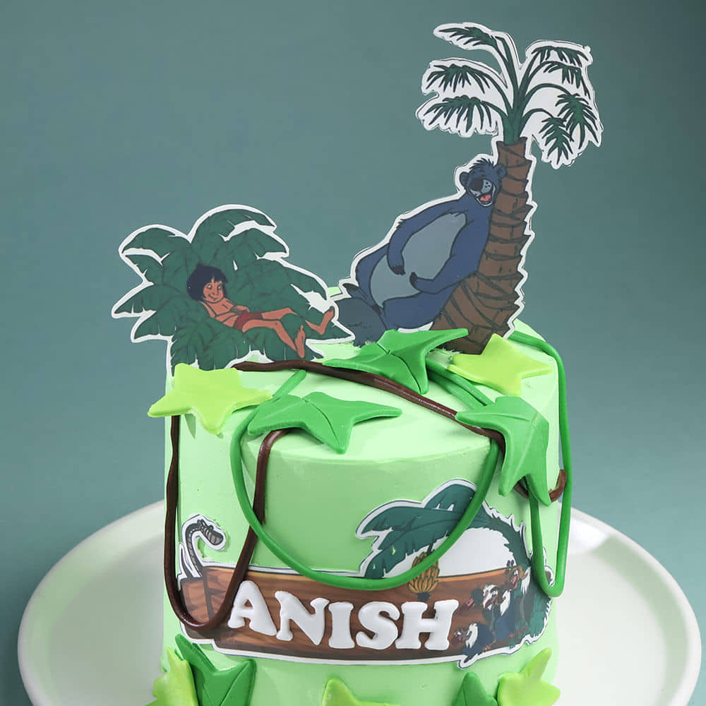Front View of Magical Jungle Book Theme Cake