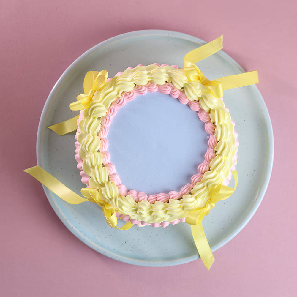 Top View of Pastel Wrap Ribbon Cake