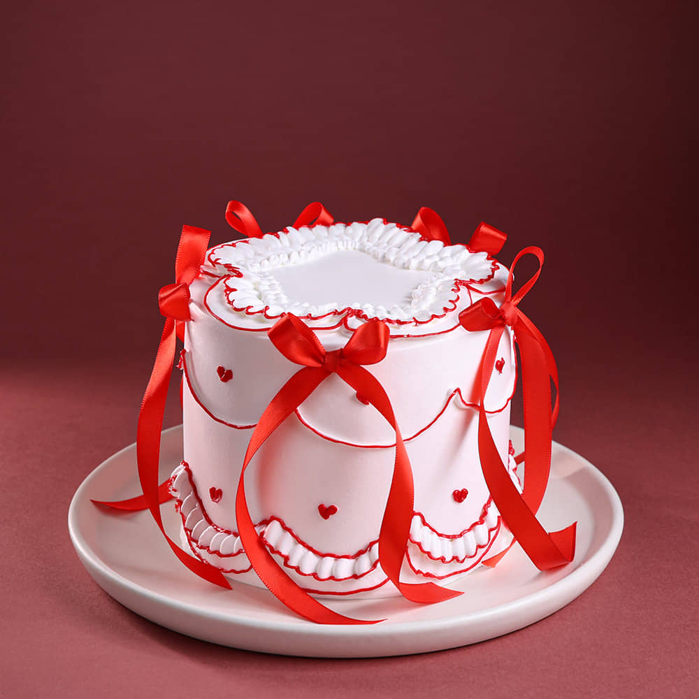 Front Angled View of Red Hearts N Ribbon Cake