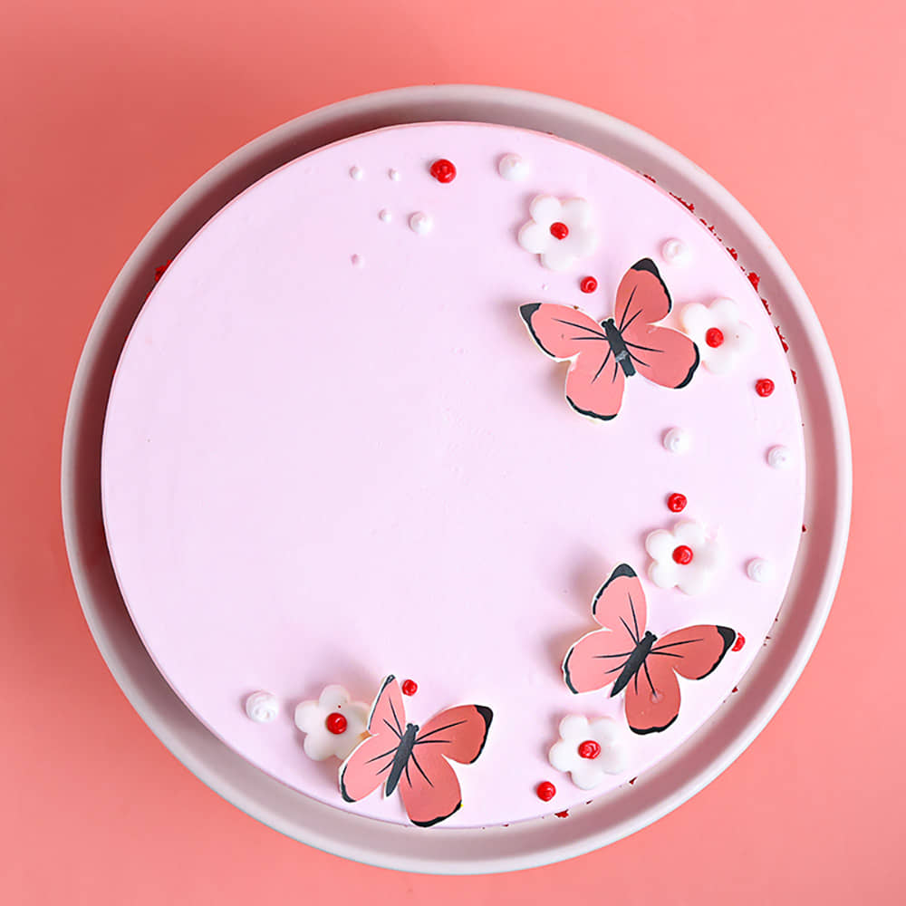 Top View of Butterfly N Flowers Red Velvet Cake