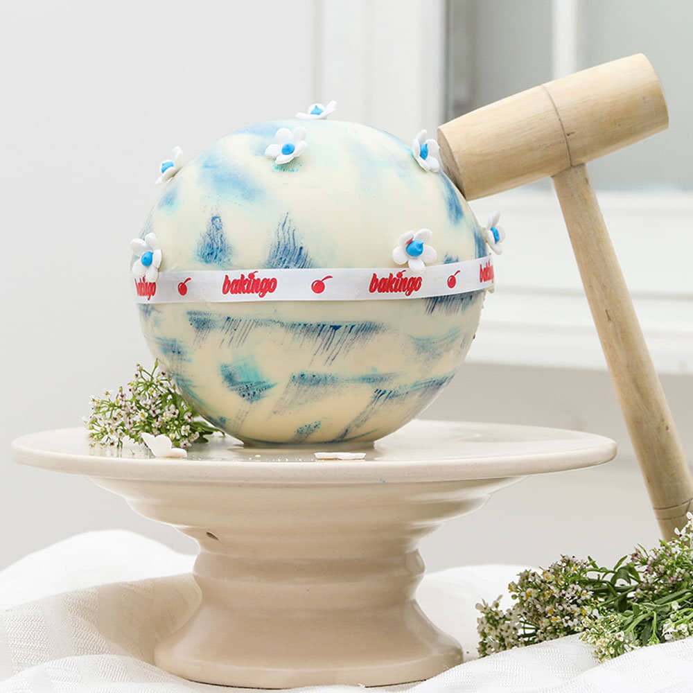 Snowy Chocolate Pinata Cake Online