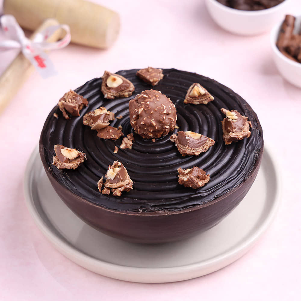 Smashing Ferrero Rocher and Kitkat Pinata Ball Cake
