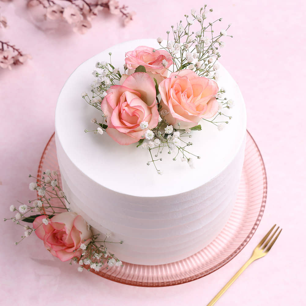 Front View of Creamy Vanilla Rose Cake 