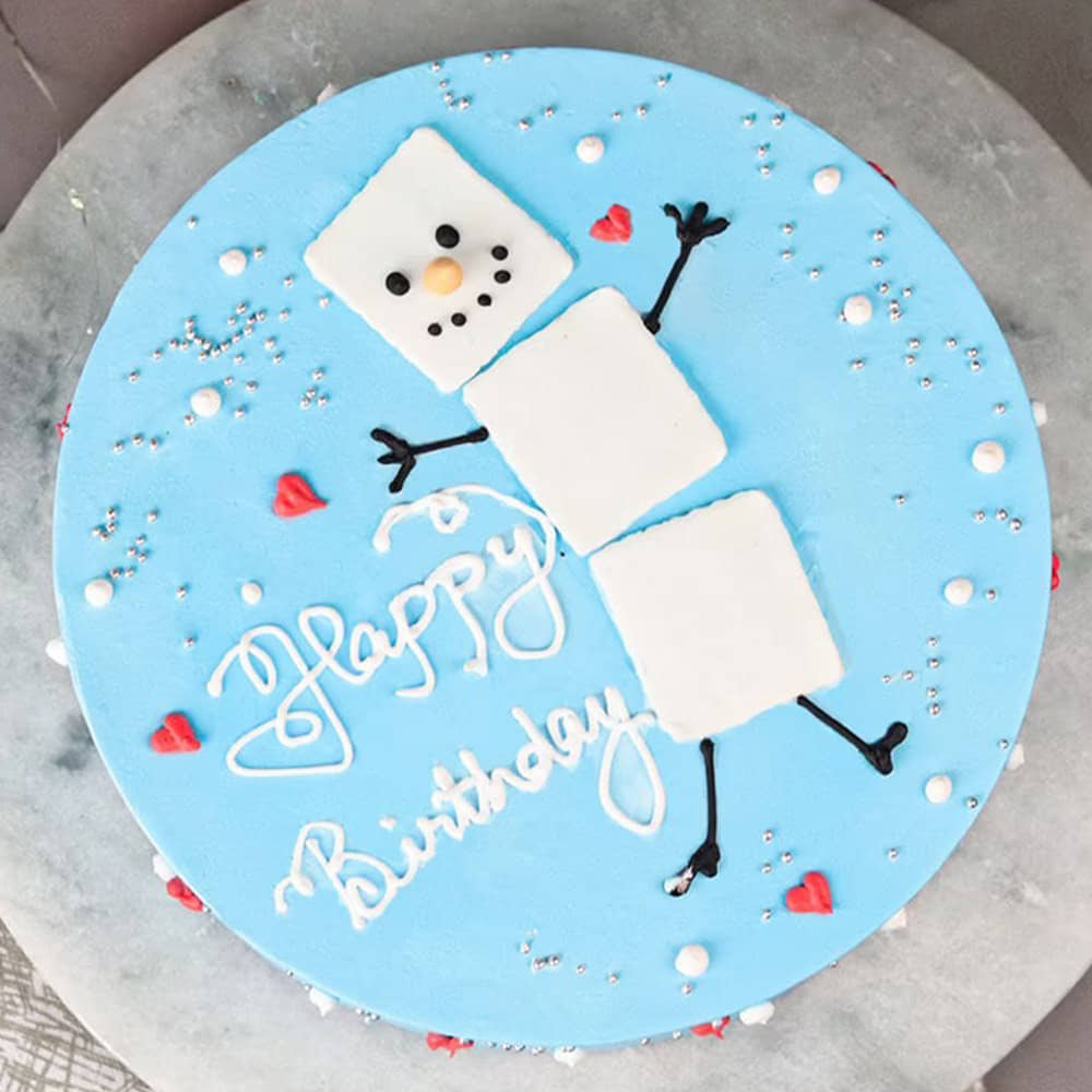 Top View of Snowman Vanilla Birthday Cake