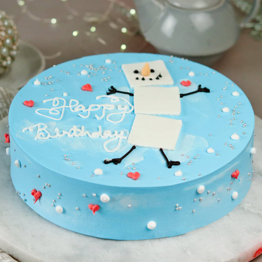 Side View of Snowman Vanilla Birthday Cake