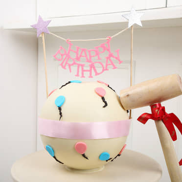 Pineapple Birthday Pinata Cake with Hammer